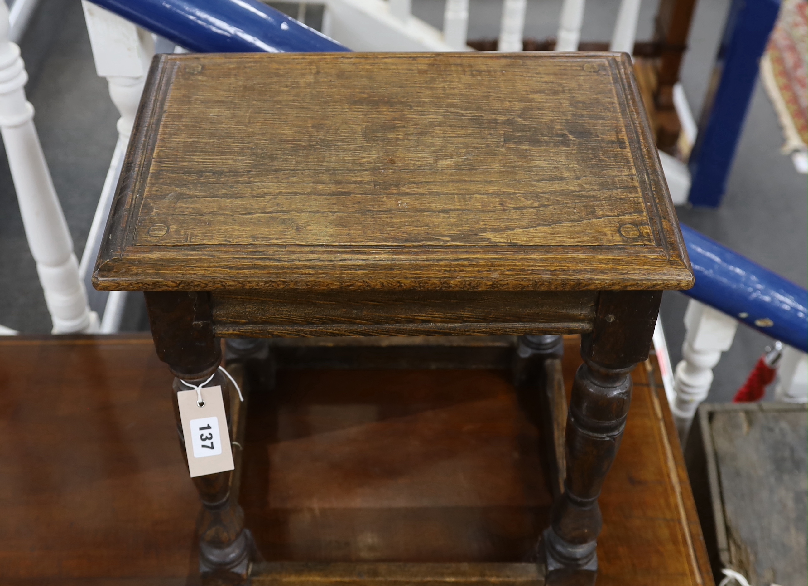 An 18th century style oak joint stool, width 42cm, depth 28cm, height 47cm